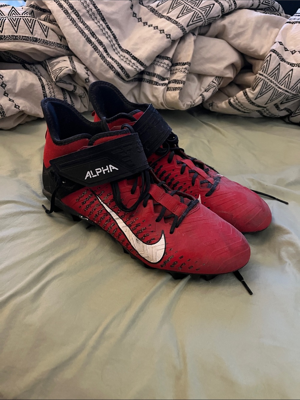 Nike Red and Black Alpha Men’s Football Cleat with White Swoosh